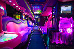 Chauffeur driven Party Bus limo hire interior in Bristol, Gloucester, Cheltenham, Cardiff, Wales, Weston Super Mare, and Bath.