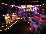 Chauffeur stretched pink Hummer H2 limo hire interior in Bristol, Gloucester, Cheltenham, Cardiff, Wales, Weston Super Mare, and Bath.